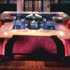 limelight New York bar, book-matched marble inlay top, sculpted bases.