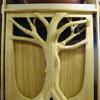 Carved entry doors, tree sculpture